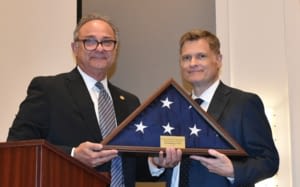 Photo of Chief Justice Muñiz and Judge Flower with the award.