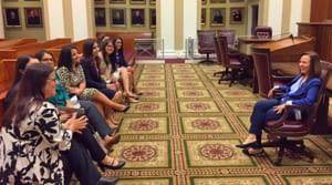 Image of Justice Pariente speaking with leaders from Florida International University