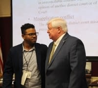 Justice Lewis and teacher