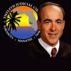 This is a picture of Circuit Judge Charles E. Roberts and the 12th Judicial Circuit Court logo