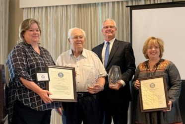 2019 FCPIO Award Winners (l-r): Robyn Gable, 14th Judicial Circuit (Excellence in Communications); Justice Gerald Kogan (retired), Lifetime Achievement Award; Judge David Dugan, 18th Judicial Circuit (Judicial Outreach Award); Amber Baggett, 14th Judicial Circuit (Excellence in Communications)
