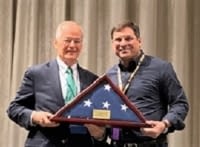 Judge Bernstein receives Judicial Excellence Award from Chief Justice Canady.